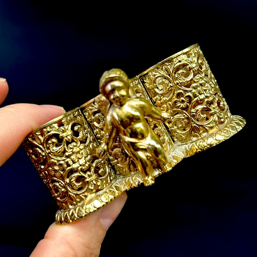 Mid Century gold-tone ornate metal with cherub 3 slot lipstick holder